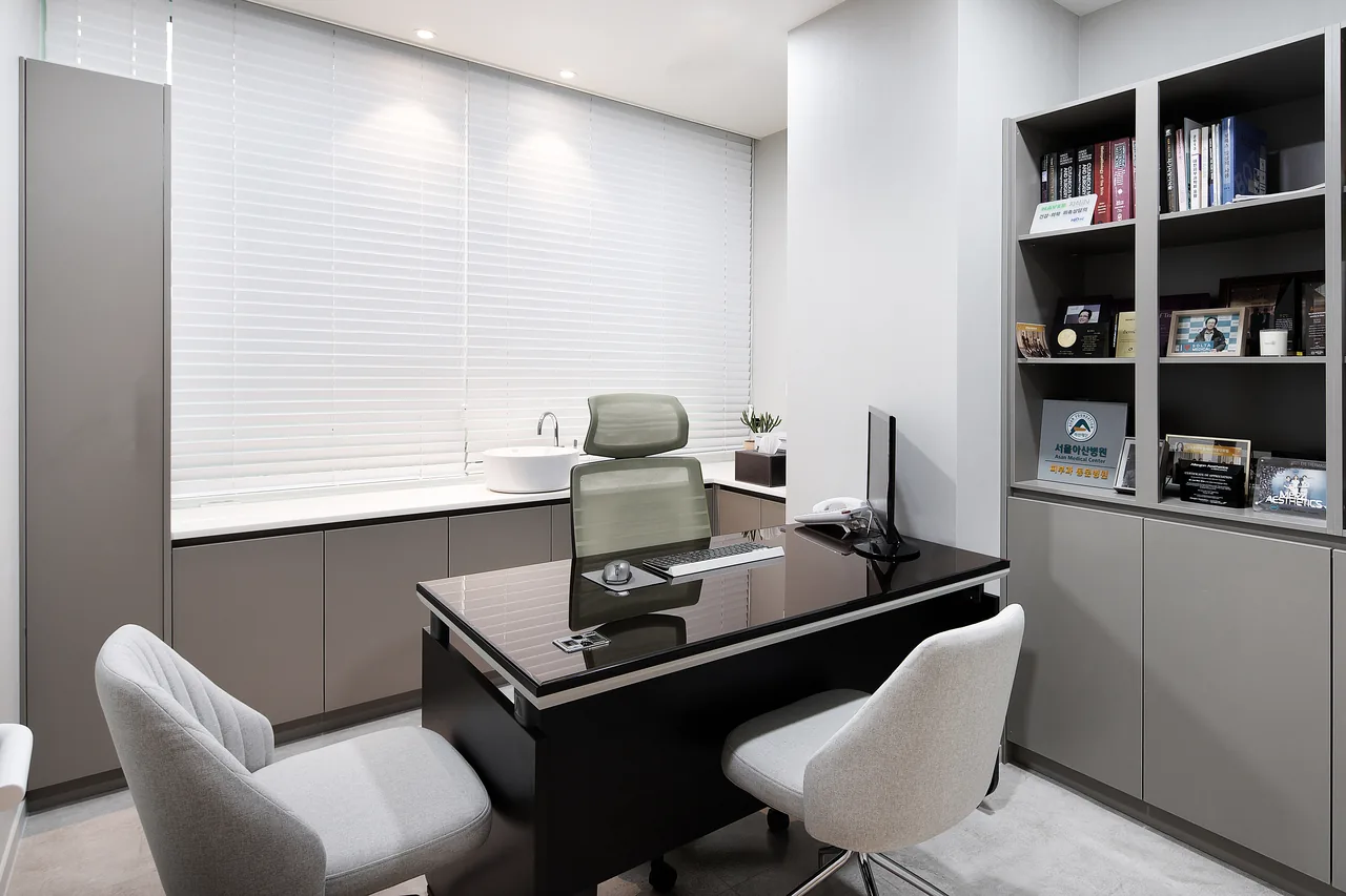 Dermatologist's office at WELLS Clinic, Apgujeong, where forehead filler plans are reviewed